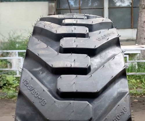 Шина Ozka 12.5/80-18 PR14 IND85 ТBL